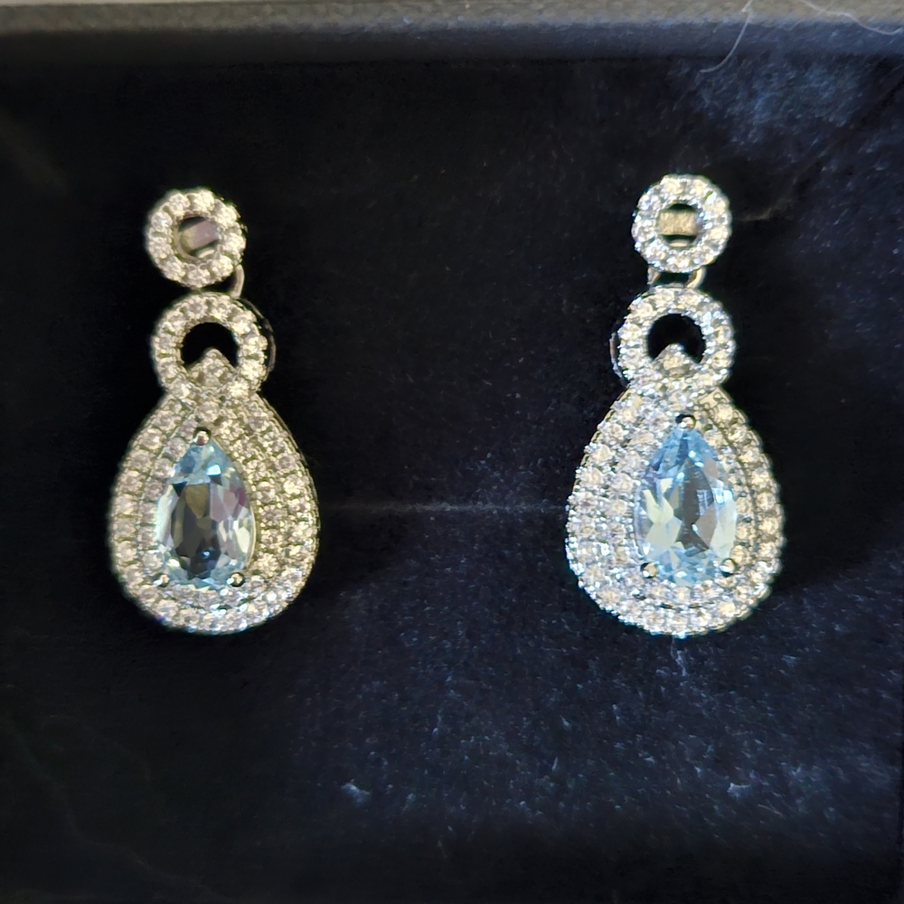 BRAND NEW. Elegant Platinum Plated Silver and  Blue Aquamarine Teardrop Earrings